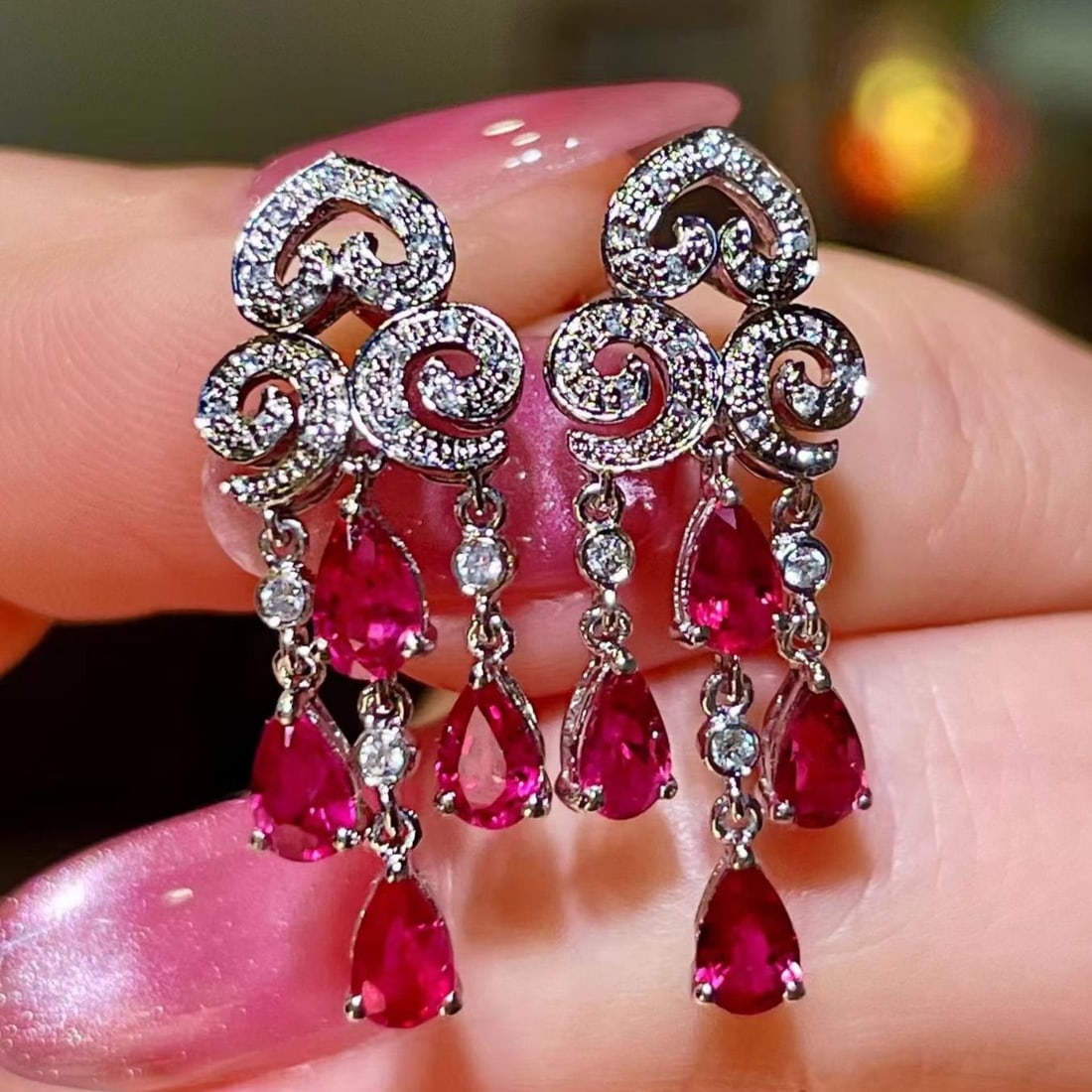 14k Gold 2.18 Ctw Natural Ruby & Diamond Earrings: Ref:231189128 // gold content:14k gold // main gemstone:ruby // shape:pear // carat weight:2. 02ct // color:red // treatment:natural // // adjacent gemstone 2 : diamond // shape:round // carat
