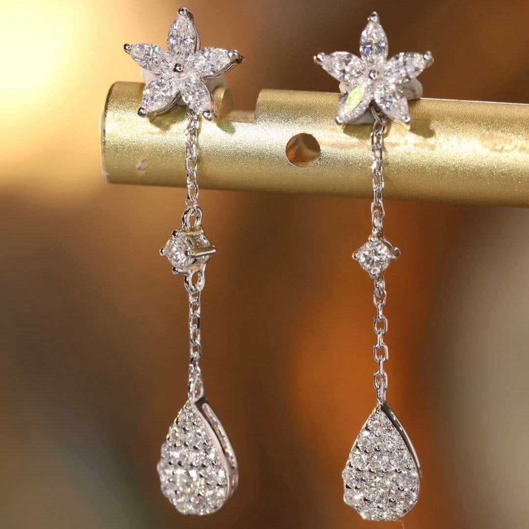 14k Gold 0.6 Ct Natural H Diamond Earrings: Ref:231189148 // gold content:14k gold // main gemstone:diamond // shape:multiple // carat weight:0. 6ct // clarity grade:vs-si // color:h // treatment:natural // Condition: New Low Estimate: 3300.00