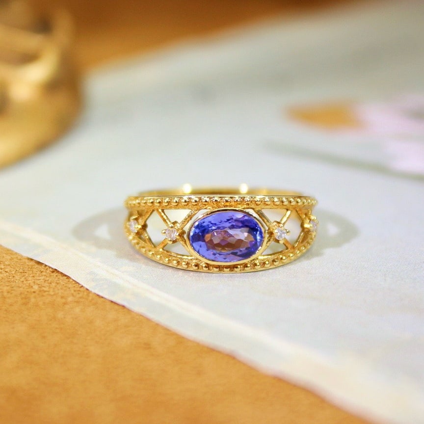 14k Gold 1.13 Ct Natural Tanzanite & Diamond Ring: Ref:231189165 // gold content:14k gold // ring size:7. 25us // // main gemstone:tanzanite // shape:oval // carat weight:1. 13ct // color:blue // treatment:natural // // adjacent gemstone 2 : diamond