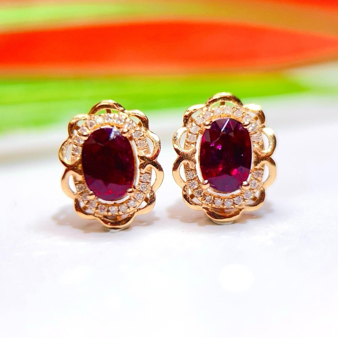 14k Gold 1.42 Ctw Natural Tourmaline & Diamond Earrings: Ref:231189180 // gold content:14k gold // main gemstone:tourmaline // shape:oval // carat weight:1. 3ct // color:red // treatment:natural // // adjacent gemstone 2 : diamond // number of stones:40 // 