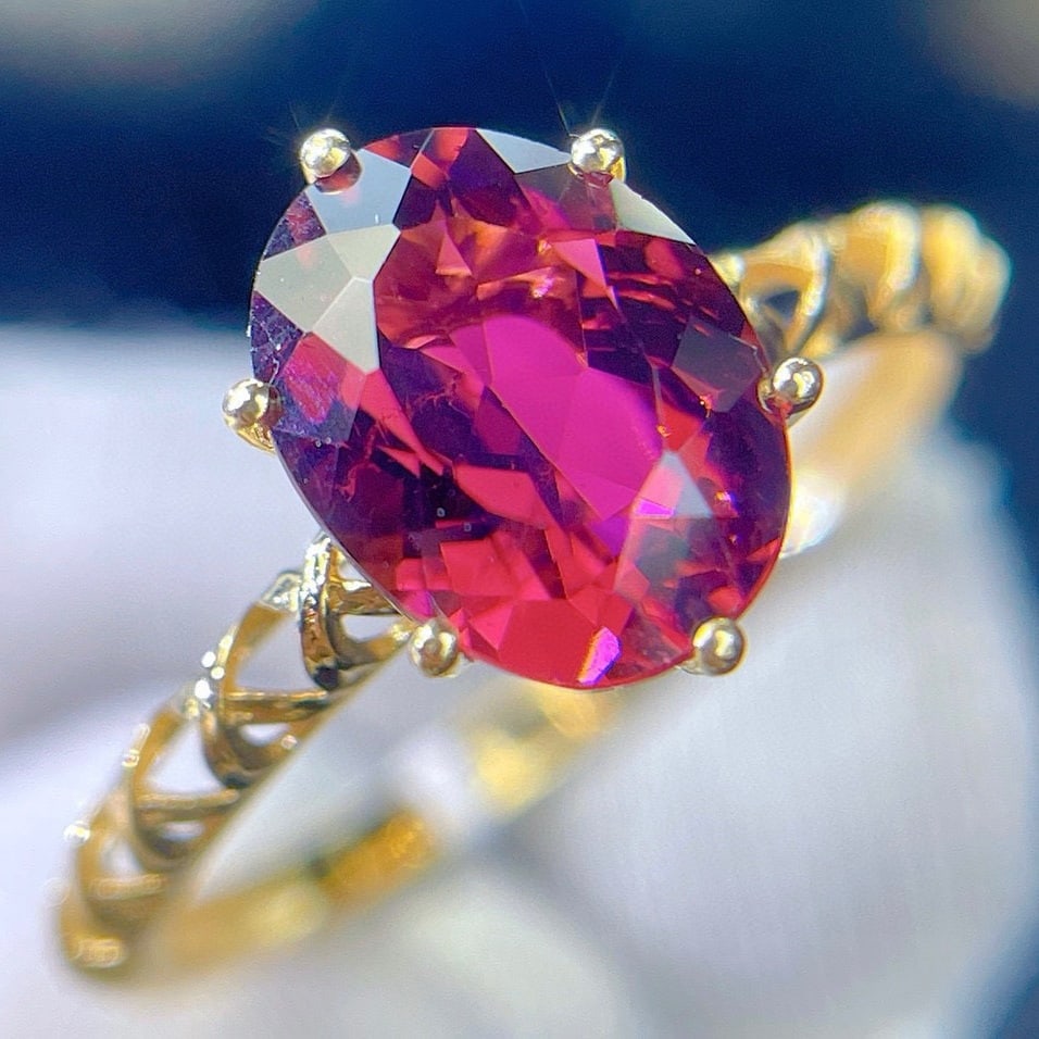 14k Gold 2.1 Ct Natural Tourmaline & Diamond Ring: Ref:231189214 // gold content:14k gold // ring size:7. 25us // // main gemstone:tourmaline // shape:oval // carat weight:2. 1ct // color:red // treatment:natural // // adjacent gemstone 2 : diamond