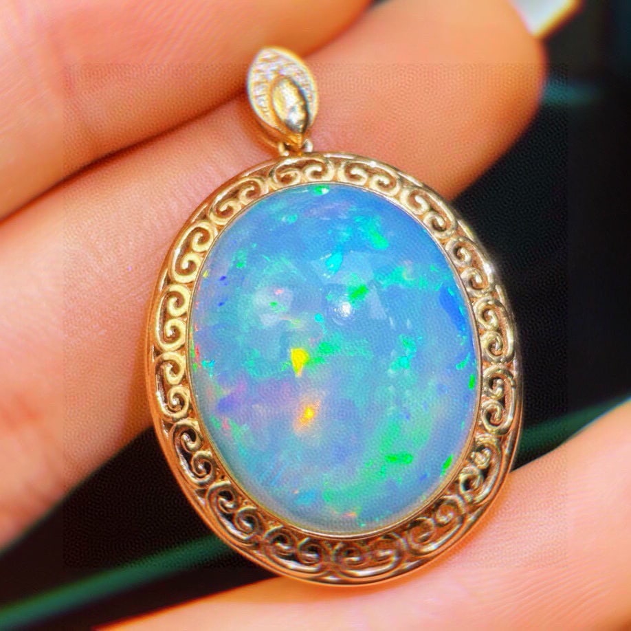 14k Gold 14.23 Ct Natural Opal & Diamond Pendant( Without Chain ): Ref:231189237 // gold content:14k gold // main gemstone:opal // shape:oval // carat weight:14. 23ct // color:white // treatment:natural // // adjacent gemstone 2 : diamond // shape:round // clarity