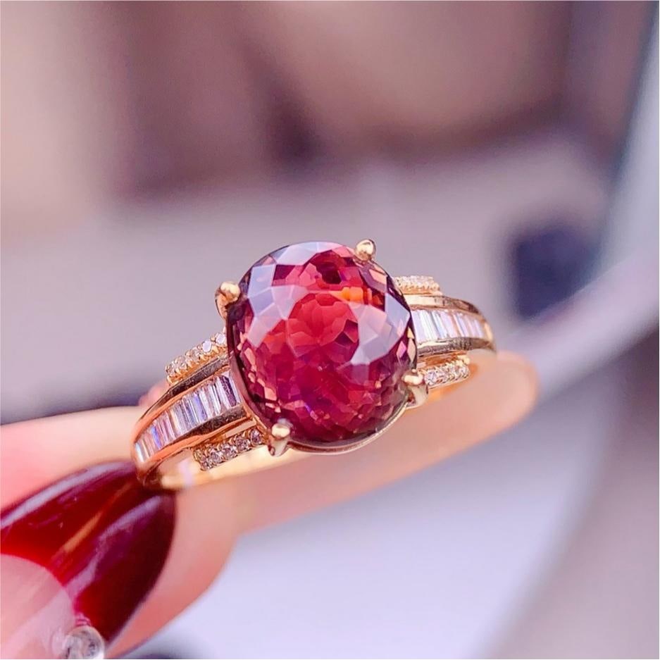 14k Gold 4.5 Ct Natural Tourmaline & Diamond Ring: Ref:231189259 // gold content:14k gold // ring size:7. 25us // // main gemstone:tourmaline // shape:oval // carat weight:4. 5ct // color:red // treatment:natural // // adjacent gemstone 2 : diamond