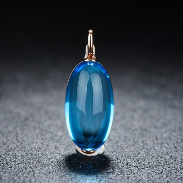 14k Gold 23.46 Ct Natural Topaz Pendant( Without Chain ): Ref:231190014 // gold content:14k gold // main gemstone:topaz // shape:oval // carat weight:23. 46ct // color:blue // treatment:natural // Condition: New Low Estimate: 2400.00 High Estimate: 3600.00