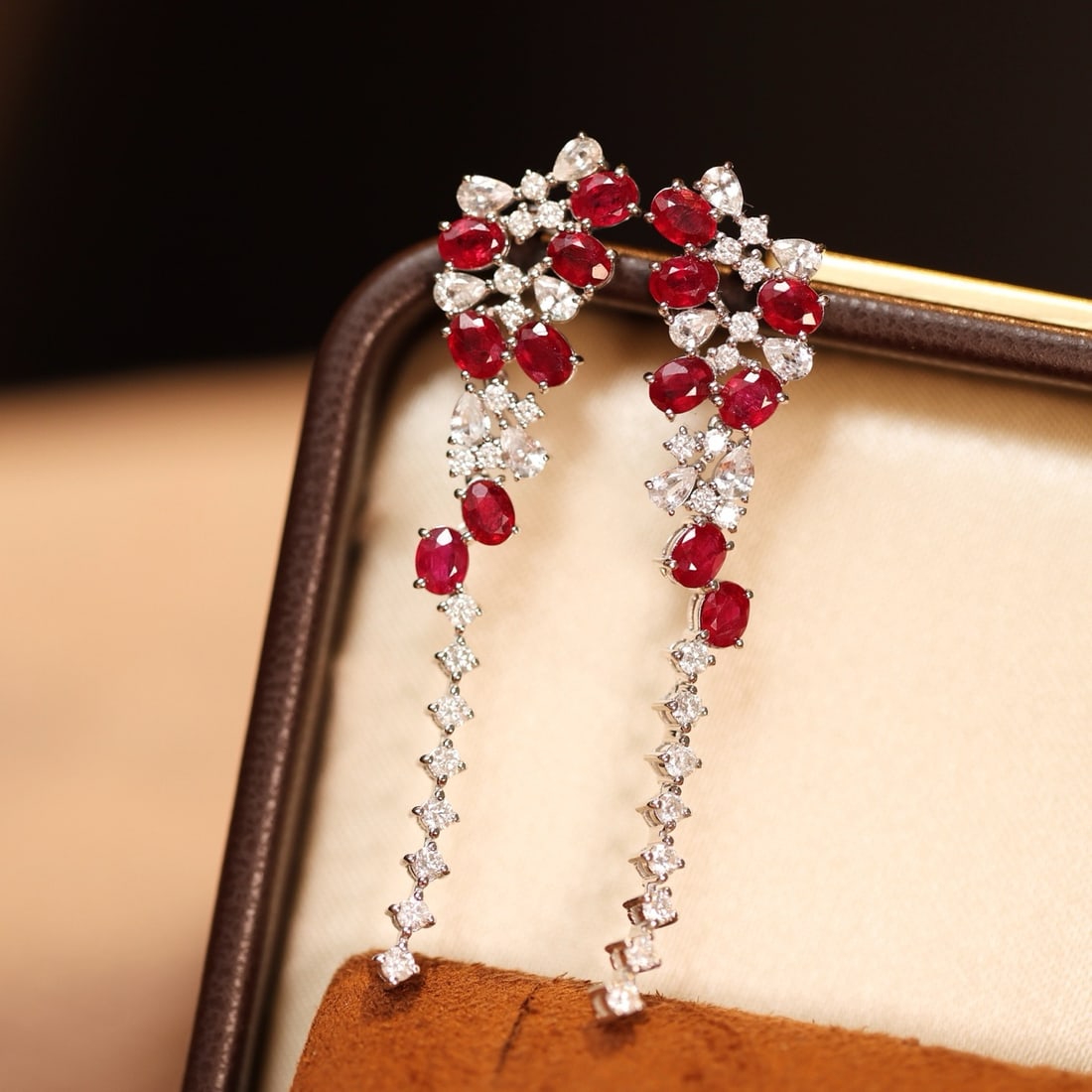 14k Gold 3.34 Ctw Vivid Red Natural Ruby & Sapphire Earrings: Ref:231190034 // gold content:14k gold // main gemstone:ruby // shape:oval // carat weight:2. 44ct // color:vivid red // treatment:natural // // adjacent gemstone 2 : sapphire // shape:pear // carat w