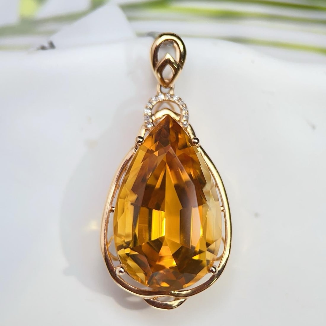 14k Gold 14.43 Ctw Natural Citrine & Diamond Pendant( Without Chain ): Ref:231190066 // gold content:14k gold // main gemstone:citrine // shape:pear // carat weight:14. 4ct // color:yellow // treatment:natural // // adjacent gemstone 2 : diamond // number of stones:12 //