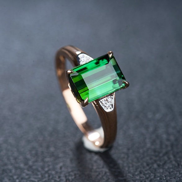 14k Gold 2.2 Ct Natural Tourmaline & Diamond Ring: Ref:231190108 // gold content:14k gold // ring size:7. 25us // // main gemstone:tourmaline // shape:octagonal // carat weight:2. 2ct // color:green // treatment:natural // // adjacent gemstone 2 :