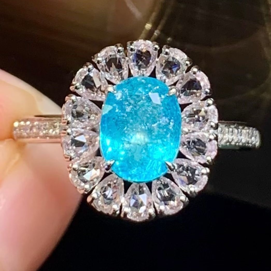 14k Gold 1.1 Ct Natural Paraiba Tourmaline & Diamond & Sapphire Ring: Ref:231190109 // gold content:14k gold // ring size:7. 25us // // main gemstone:paraiba tourmaline // shape:oval // carat weight:1. 1ct // color:blue // treatment:natural // // adjacent gemstone 2 :