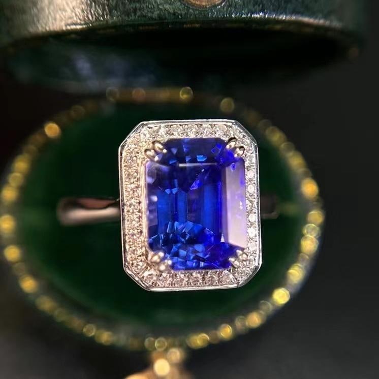 14k Gold 4.51 Ctw Natural Tanzanite & Diamond Ring: Ref:231190114 // gold content:14k gold // ring size:7. 25us // // main gemstone:tanzanite // shape:octagonal // carat weight:4. 40ct // color:blue // treatment:natural // // adjacent gemstone 2 : diam