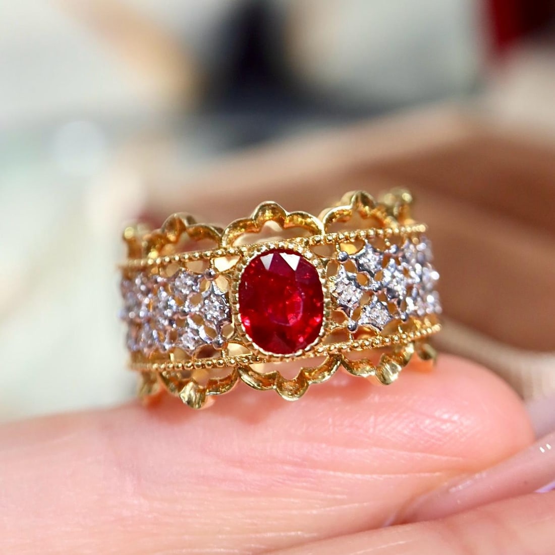 14k Gold 0.84 Ctw Natural Ruby & Diamond Ring: Ref:231190121 // gold content:14k gold // ring size:7. 25us // // main gemstone:ruby // shape:oval // carat weight:0. 79ct // color:red // treatment:natural // // adjacent gemstone 2 : diamond //
