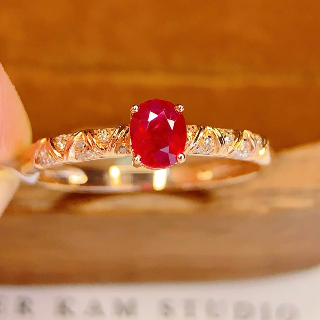14k Gold 0.6 Ct Vivid Red Natural Ruby & Diamond Ring: Ref:231190220 // gold content:14k gold // ring size:7. 25us // // main gemstone:ruby // shape:oval // carat weight:0. 6ct // color:vivid red // treatment:natural // // adjacent gemstone 2 : diamond //