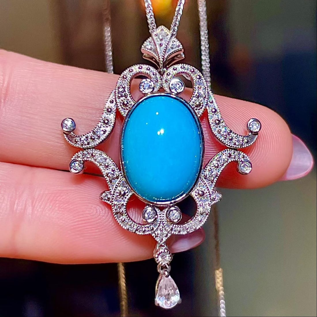 14k Gold 5.63 Ctw Natural Blue Turquoise & Sapphire Pendant( Without Chain ): Ref:231190251 // gold content:14k gold // main gemstone:blue turquoise // shape:oval // carat weight:5. 37ct // color:blue // treatment:natural // // adjacent gemstone 2 : sapphire // shape:pear //