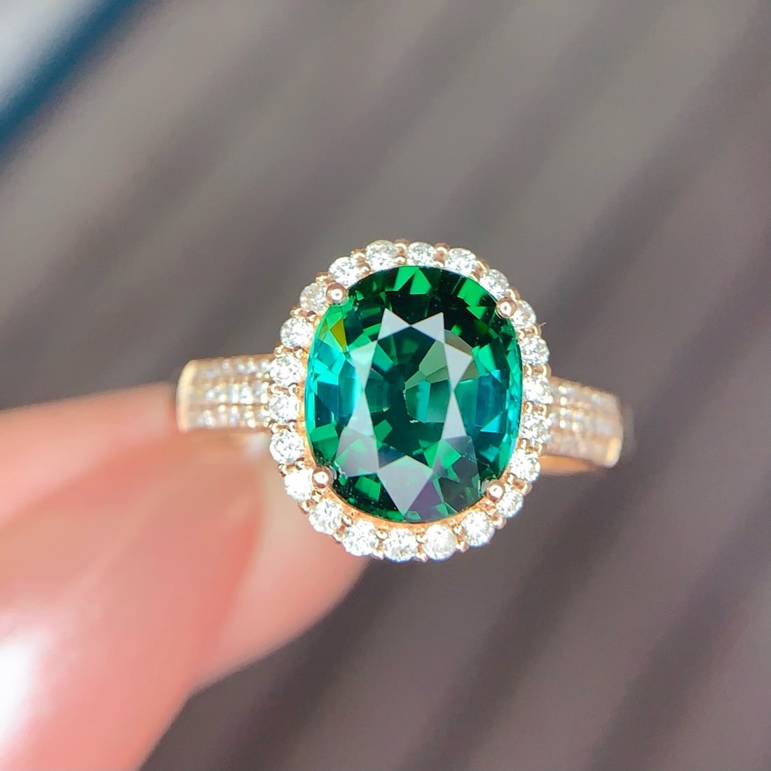 14k Gold 2.3 Ct Natural Tourmaline & Diamond Ring: Ref:231190253 // gold content:14k gold // ring size:7. 25us // // main gemstone:tourmaline // shape:oval // carat weight:2. 3ct // color:green // treatment:natural // // adjacent gemstone 2 : diamond