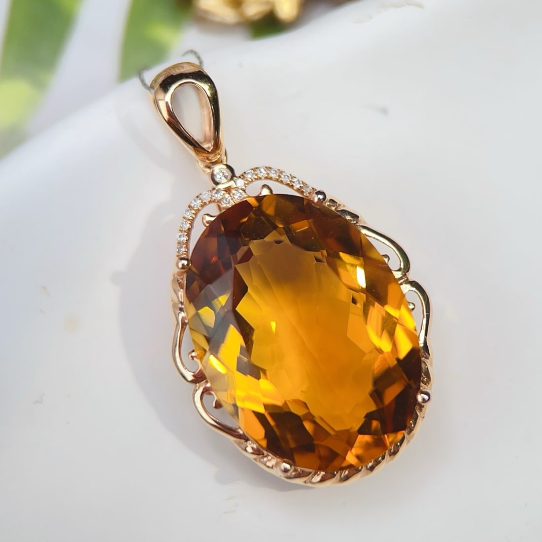 14k Gold 16.50 Ctw Natural Citrine & Diamond Pendant( Without Chain ): Ref:231190256 // gold content:14k gold // main gemstone:citrine // shape:oval // carat weight:16. 45ct // color:yellow // treatment:natural // // adjacent gemstone 2 : diamond // number of stones:17 /