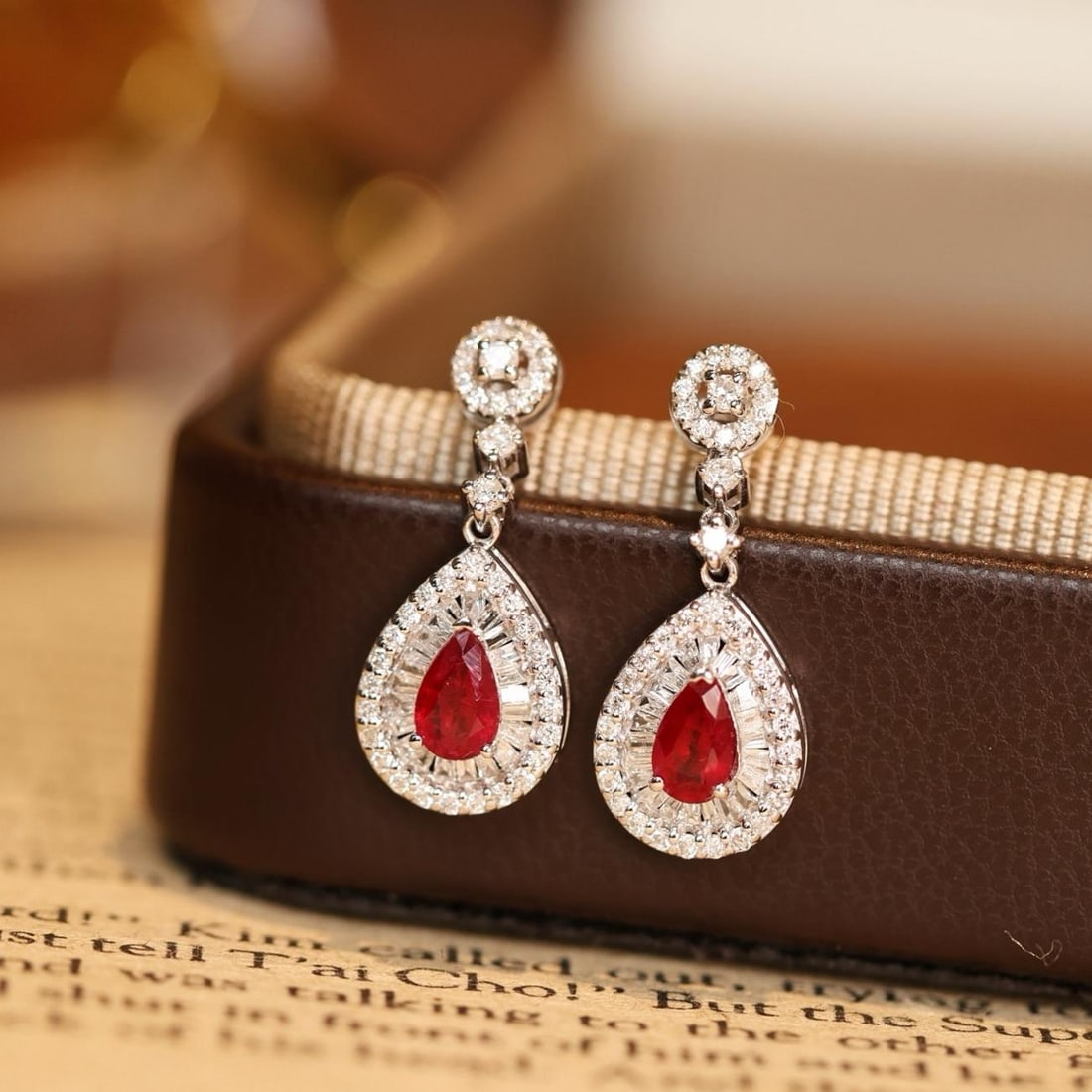 14k Gold 1.06 Ctw Natural Ruby & Diamond Earrings: Ref:231190267 // gold content:14k gold // main gemstone:ruby // shape:pear // carat weight:0. 5ct // color:red // treatment:natural // // adjacent gemstone 2 : diamond // shape:multiple // carat weigh
