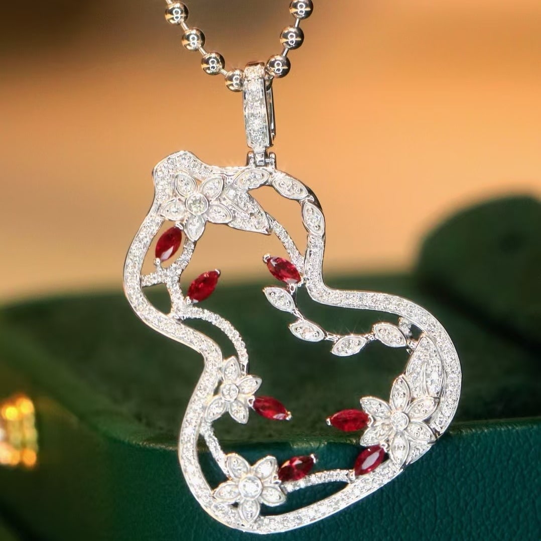 14k Gold 1.23 Ctw Natural Ruby & Diamond Pendant( Without Chain ): Ref:231190279 // gold content:14k gold // main gemstone:ruby // shape:marquise // carat weight:0. 65ct // color:red // treatment:natural // // adjacent gemstone 2 : diamond // shape:round // carat