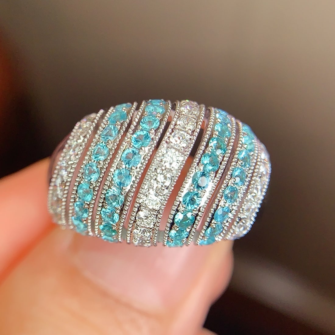 14k Gold 1.21 Ctw Natural Paraiba Tourmaline & Diamond Ring: Ref:231190297 // gold content:14k gold // ring size:7. 25us // // main gemstone:paraiba tourmaline // shape:round // carat weight:0. 7ct // color:blue // treatment:natural // cut grade:g // //
