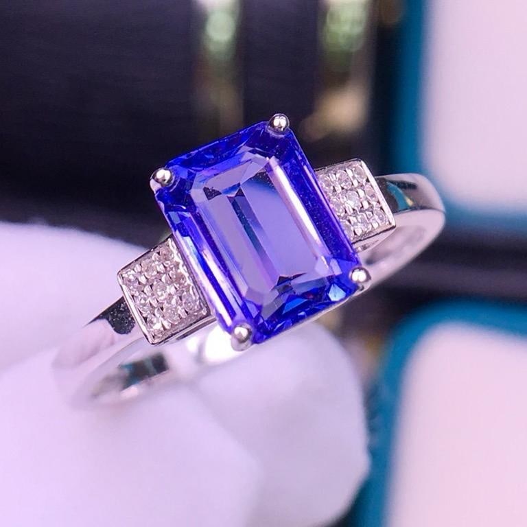 14k Gold 2.5 Ct Natural Tanzanite & Diamond Ring: Ref:231190299 // gold content:14k gold // ring size:7. 25us // // main gemstone:tanzanite // shape:octagonal // carat weight:2. 5ct // color:blue // treatment:natural // // adjacent gemstone 2 :