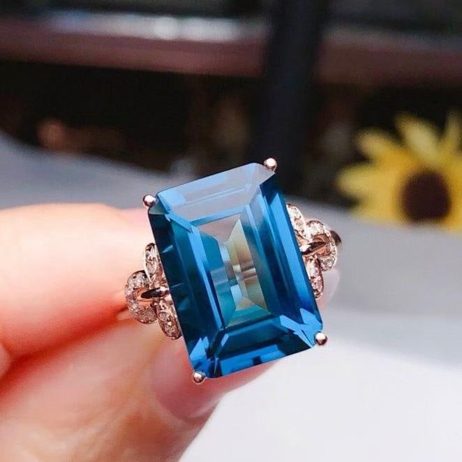 14k Gold 8.15 Ct Natural Topaz & Diamond Ring: Ref:231190332 // gold content:14k gold // ring size:7. 25us // // main gemstone:topaz // shape:octagonal // carat weight:8. 15ct // color:blue // treatment:natural // // adjacent gemstone 2 : diamond