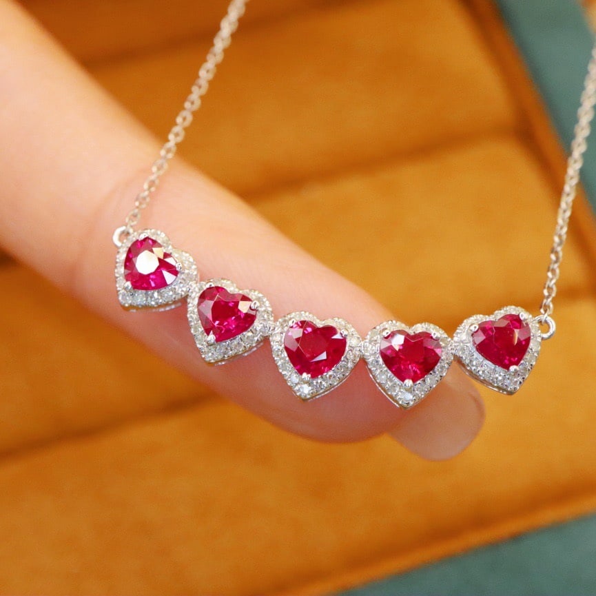 14k Gold 1.72 Ctw Natural Ruby & Diamond Necklace: Ref:231190354 // gold content:14k gold // main gemstone:ruby // shape:heart // carat weight:1. 50ct // color:red // treatment:natural // // adjacent gemstone 2 : diamond // number of stones:75 //