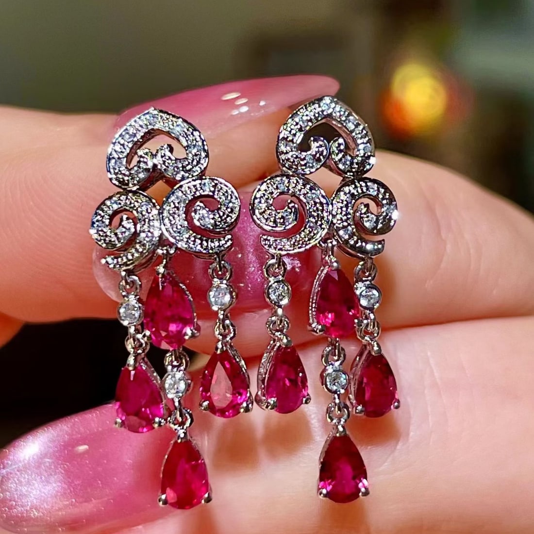 14k Gold 2.18 Ctw Natural Ruby & Diamond Earrings: Ref:231190361 // gold content:14k gold // main gemstone:ruby // shape:pear // carat weight:2. 02ct // color:red // treatment:natural // // adjacent gemstone 2 : diamond // shape:round // carat