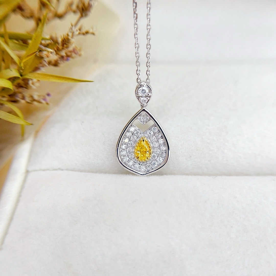 14k Gold 0.43 Ctw Natural Yellow Diamond & Diamond Necklace: Ref:231190373 // gold content:14k gold // main gemstone:yellow diamond // shape:oval // carat weight:0. 12ct // color:yellow // treatment:natural // // adjacent gemstone 2 : diamond // shape:round //