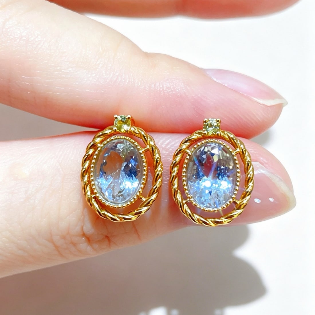 14k Gold 2.69 Ctw Natural Aquamarine & Sapphire Earrings: Ref:231190394 // gold content:14k gold // main gemstone:aquamarine // shape:oval // carat weight:2. 59ct // color:blue // treatment:natural // // adjacent gemstone 2 : sapphire // shape:round //