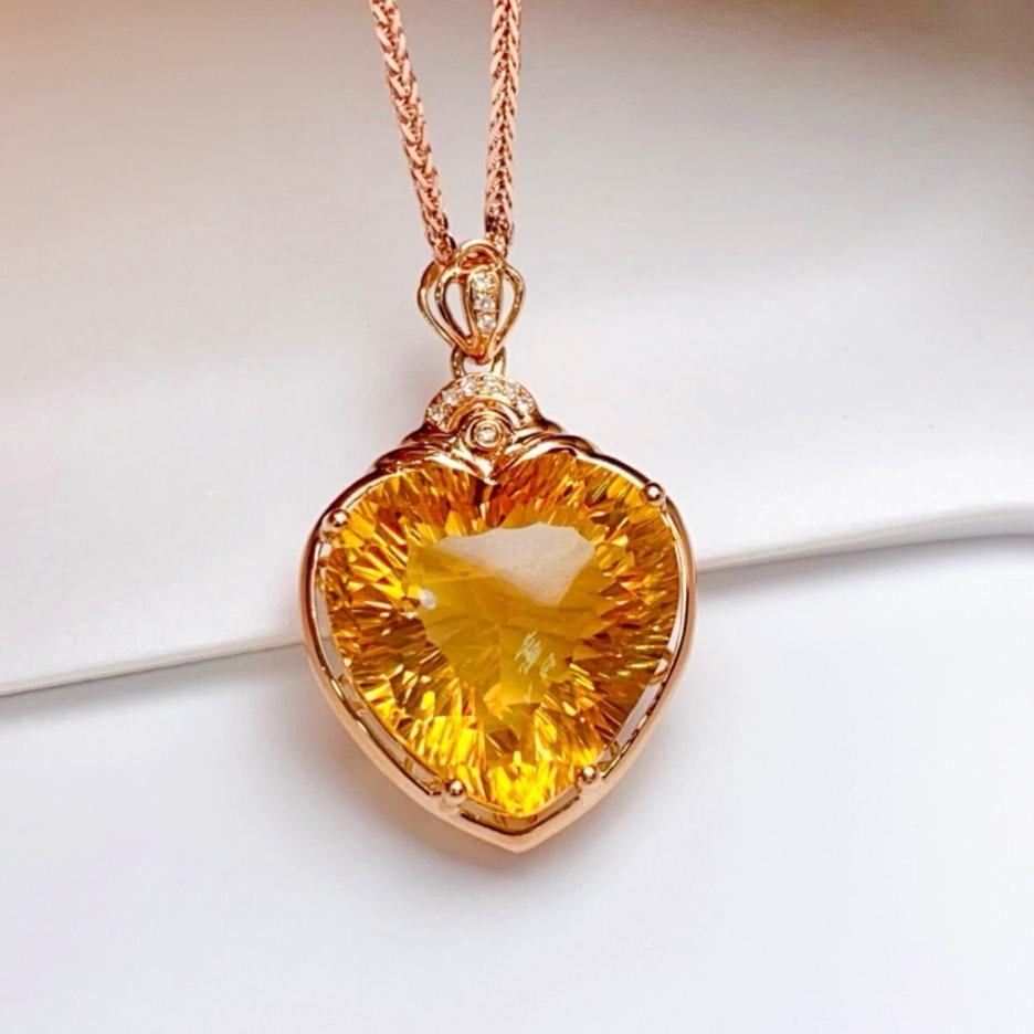 14k Gold 11.00 Ct Natural Citrine & Diamond Pendant( Without Chain ): Ref:231190396 // gold content:14k gold // main gemstone:citrine // shape:heart // carat weight:11. 00ct // color:yellow // treatment:natural // // adjacent gemstone 2 : diamond // number of stones:10 
