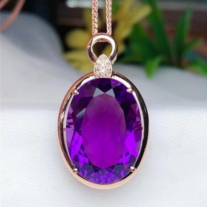 14k Gold 12.45 Ct Natural Amethyst & Diamond Pendant( Without Chain ): Ref:231190401 // gold content:14k gold // main gemstone:amethyst // shape:oval // carat weight:12. 45ct // color:purple // treatment:natural // // adjacent gemstone 2 : diamond // number of stones:10 