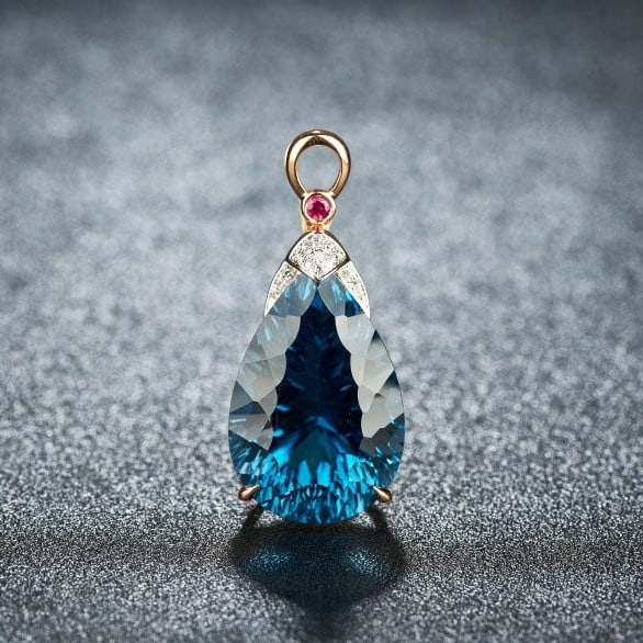 14k Gold 21.45 Ct Natural Topaz & Diamond & Ruby Pendant( Without Chain ): Ref:231190431 // gold content:14k gold // main gemstone:topaz // shape:pear // carat weight:21. 45ct // color:blue // treatment:natural // // adjacent gemstone 2 : diamond // shape:round // clarity gr