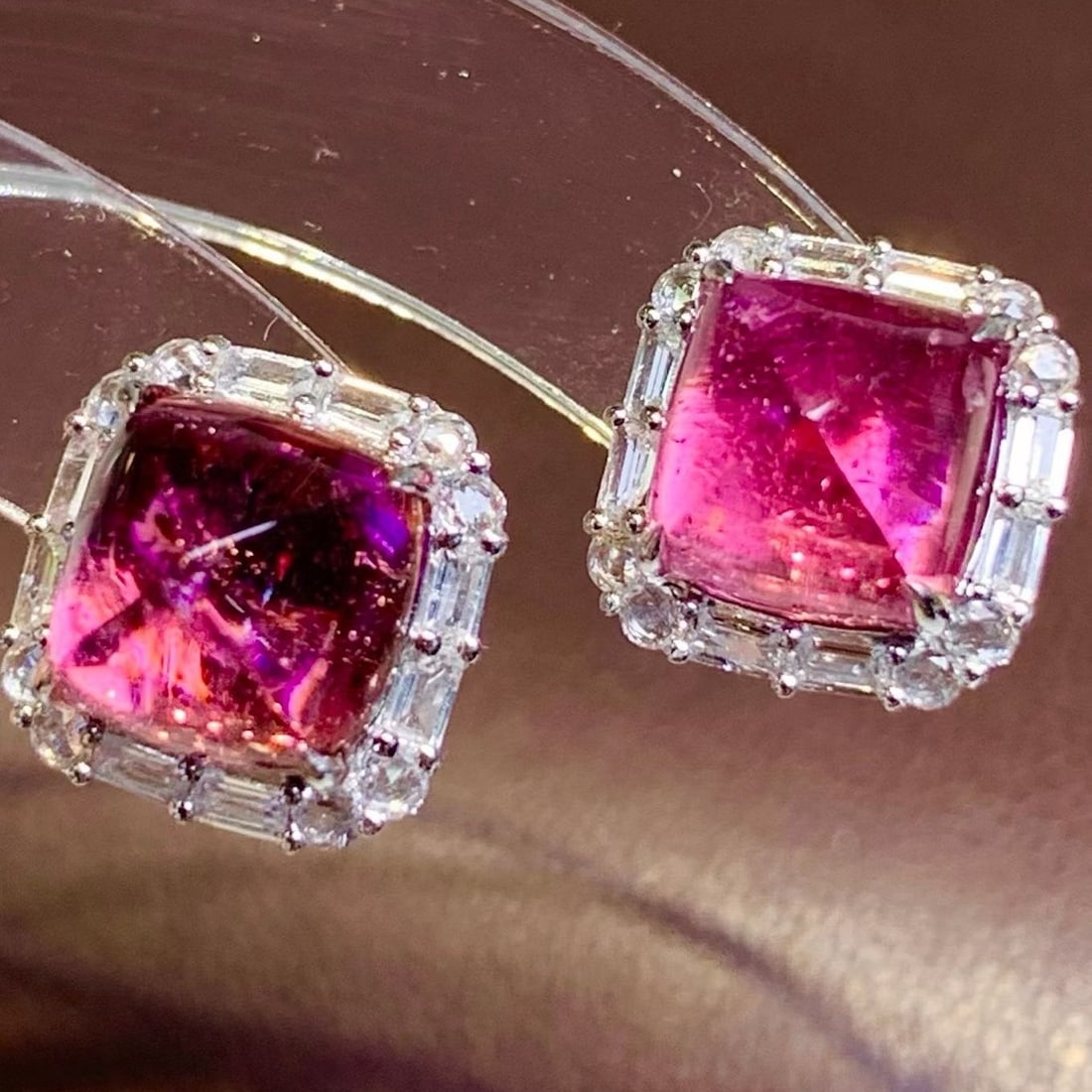 14k Gold 4.9 Ct Natural Tourmaline & Diamond & Sapphire Earrings: Ref:231190435 // gold content:14k gold // main gemstone:tourmaline // shape:sugar-loaf // carat weight:4. 9ct // color:red // treatment:natural // // adjacent gemstone 2 : diamond // shape:round //