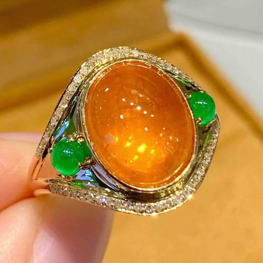 14k Gold 8.2 Ct Natural Spessartine & Diamond & Emerald Ring: Ref:231190445 // gold content:14k gold // ring size:7. 25us // // main gemstone:spessartine // shape:oval // carat weight:8. 2ct // color:orange // treatment:natural // // adjacent gemstone 2 :