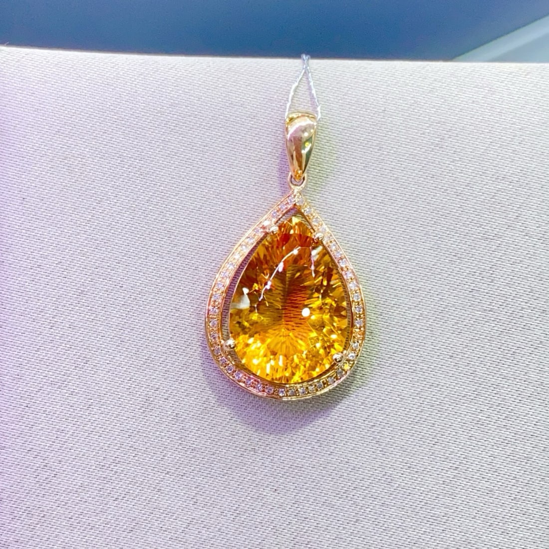 14k Gold 8.23 Ctw Natural Citrine & Diamond Pendant( Without Chain ): Ref:231190446 // gold content:14k gold // main gemstone:citrine // shape:pear // carat weight:8. 1ct // color:yellow // treatment:natural // // adjacent gemstone 2 : diamond // number of stones:45 // 