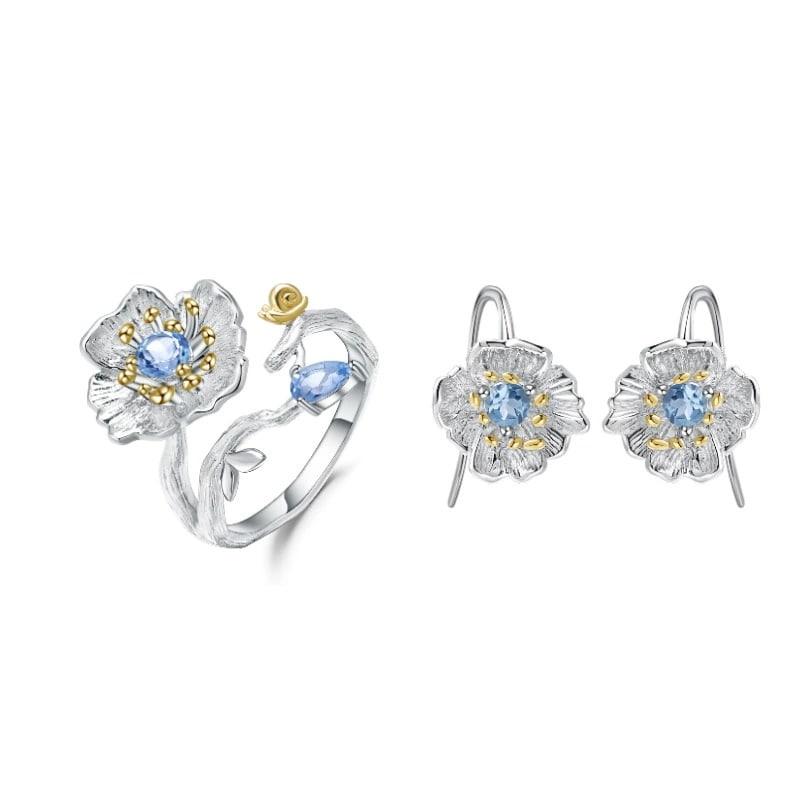 925 Sterling Silver Natural Topaz & Topaz & Flowers Jewelry Set: Ref:260821403 // gold content:925 sterling silver // ring size:7. 25us // // main gemstone:topaz // shape:pear // carat weight: // color:blue // treatment:natural // // adjacent gemstone 2 : topaz //