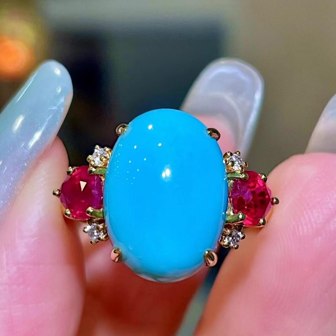 14k Gold 7.85 Ctw Natural Blue Turquoise & Ruby Ring: Ref:231189072 // gold content:14k gold // ring size:7. 25us // // main gemstone:blue turquoise // shape:oval // carat weight:6. 83ct // color:blue // treatment:natural // // adjacent gemstone 2 :