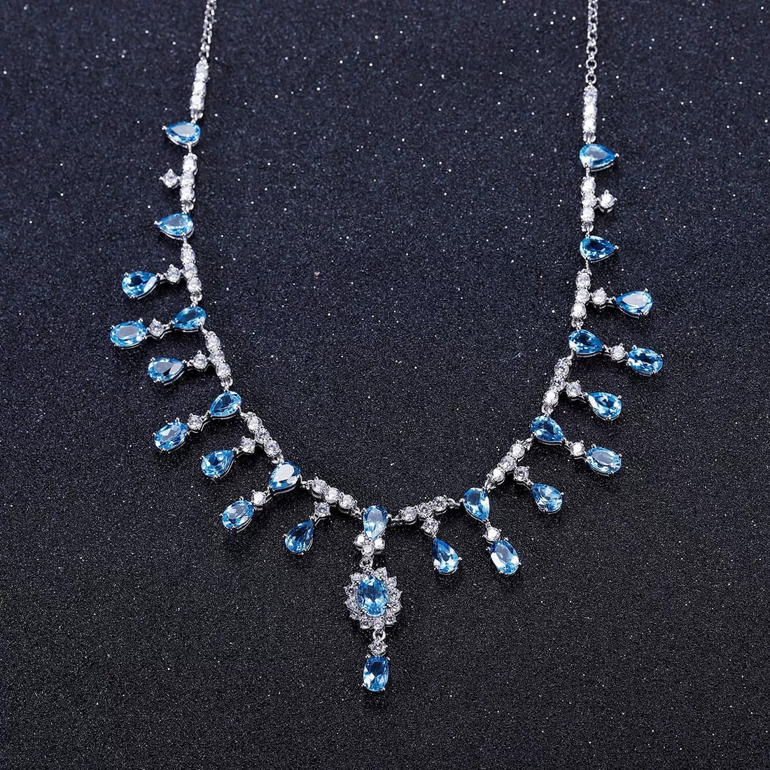 925 Sterling Silver Natural Topaz & Cubic Zirconia Necklace: Ref:260821015 // gold content:925 sterling silver // main gemstone:topaz // shape:multiple // carat weight: // color:blue // treatment:natural // // adjacent gemstone 2 : cubic zirconia //