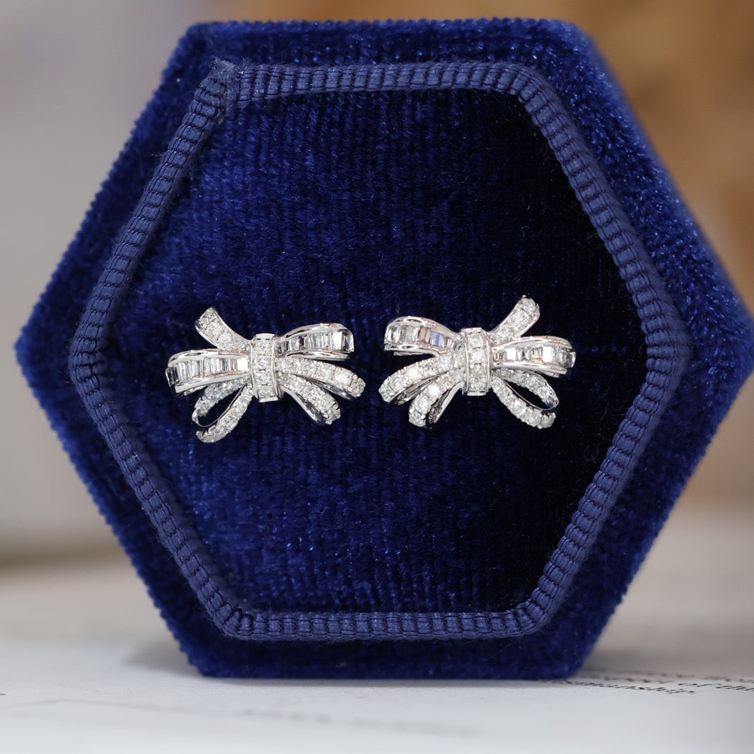 14k Gold 0.38 Ct Natural H Diamond Earrings: Ref:231108259 // gold content:14k gold // main gemstone:diamond // shape:multiple // carat weight:0. 38ct // clarity grade:vs-si // color:h // treatment:natural // Low Estimate: 1500 Condition: New Hi