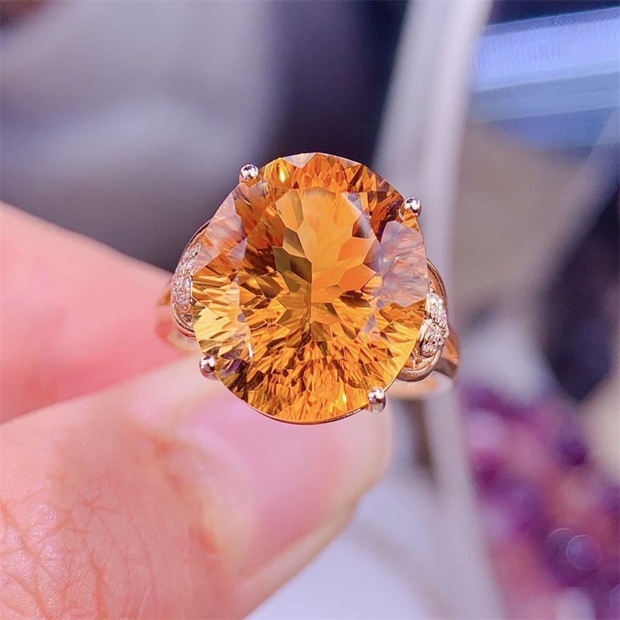 14k Gold 10.2 Ct Natural Citrine & Diamond Ring: Ref:231108330 // gold content:14k gold // ring size:7. 25us // // main gemstone:citrine // shape:oval // carat weight:10. 2ct // color:yellow // treatment:natural // // adjacent gemstone 2 : diamond