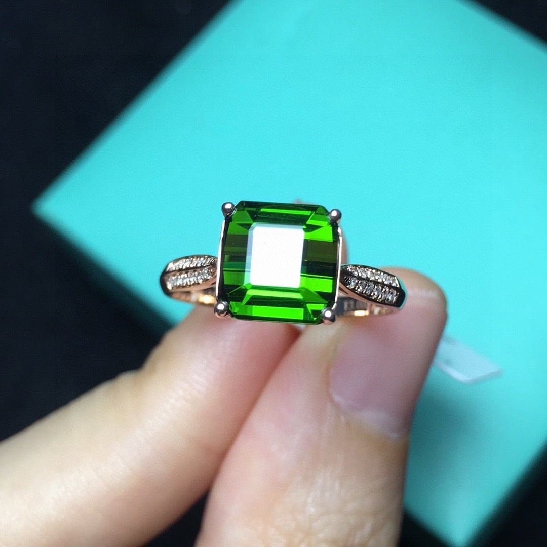 14k Gold 3.0 Ct Natural Tourmaline & Diamond Ring: Ref:231108348 // gold content:14k gold // ring size:7. 25us // // main gemstone:tourmaline // shape:octagonal // carat weight:3. 0ct // color:green // treatment:natural // // adjacent gemstone 2 :