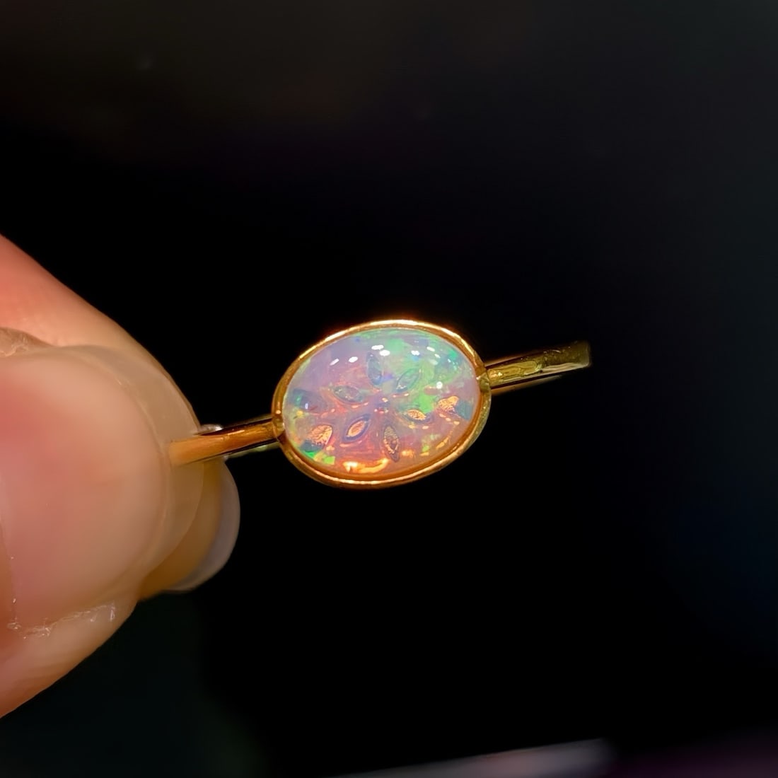 14k Gold 0.70 Ct Natural Opal Ring: Ref:231108423 // gold content:14k gold // ring size:7. 25us // // main gemstone:opal // shape:oval // carat weight:0. 70ct // color:color // treatment:natural // Condition: New Low Estimate: 1100