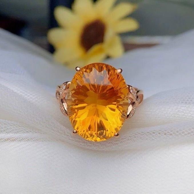 14k Gold 9.70 Ct Natural Citrine & Diamond Ring: Ref:231191024 // gold content:14k gold // ring size:7. 25us // // main gemstone:citrine // shape:oval // carat weight:9. 70ct // color:yellow // treatment:natural // // adjacent gemstone 2 : diamond /