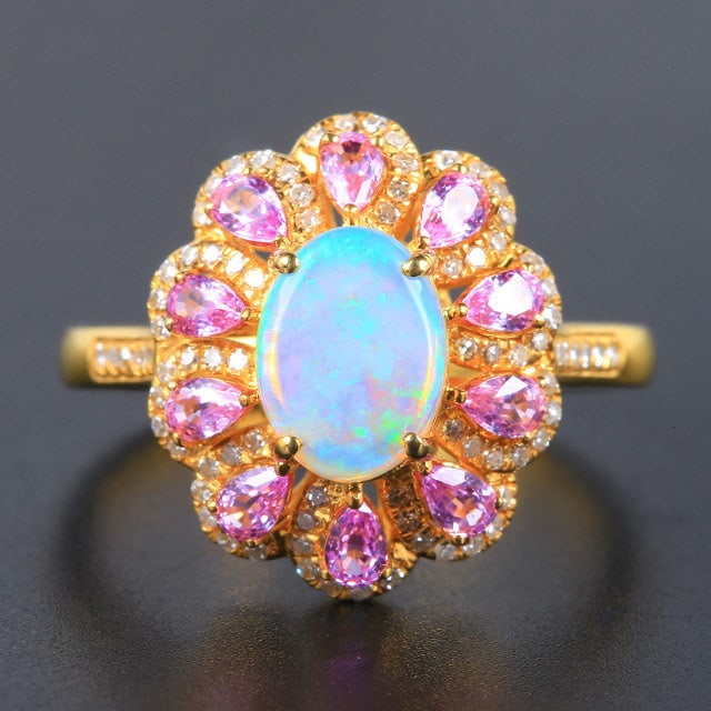 14k Gold 0.94 Ctw Natural Opal & Diamond Ring: Ref:231191133 // gold content:14k gold // ring size:7. 25us // // main gemstone:opal // shape:oval // carat weight:0. 7ct // color:white // treatment:natural // // adjacent gemstone 2 : diamond //