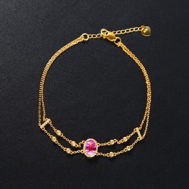 14k Gold 1.28 Ctw Natural Padparadscha Sapphire & Diamond Bracelet: Ref:231191172 // gold content:14k gold // main gemstone:padparadscha sapphire // shape:oval // carat weight:1. 1ct // color:orangish pink // treatment:natural // // adjacent gemstone 2 : diamond // nu