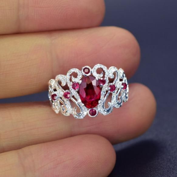 14k Gold 1.23 Ctw Natural Ruby & Ruby Ring: Ref:231192005 // gold content:14k gold // ring size:7. 25us // // main gemstone:ruby // shape:oval // carat weight:1. 02ct // color:red // treatment:natural // // adjacent gemstone 2 : ruby //
