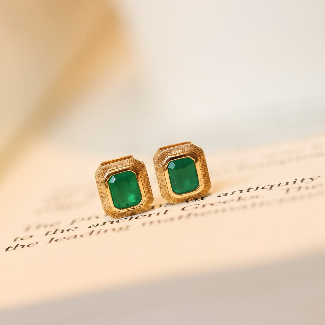 14k Gold 0.87 Ct Natural Emerald Earrings: Ref:231192313 // gold content:14k gold // main gemstone:emerald // shape:octagonal // carat weight:0. 87ct // color:green // treatment:natural // Condition: New Low Estimate: 3500.00 High Estimate:
