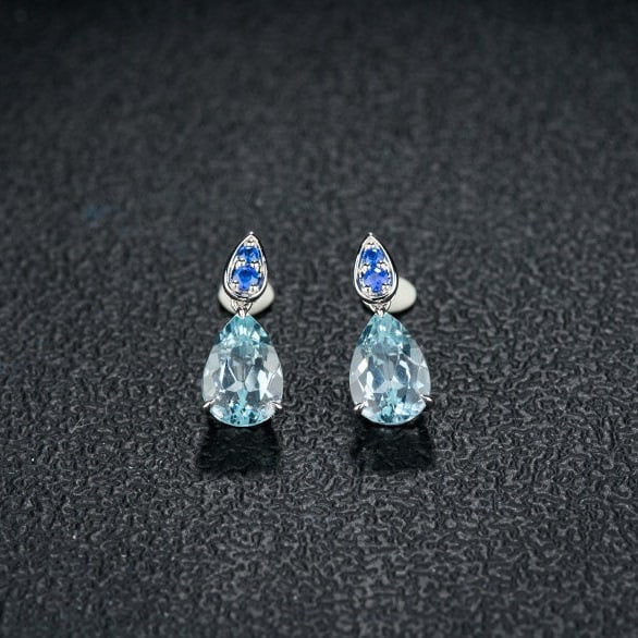 14k Gold 3.66 Ct Natural Aquamarine & Sapphire Earrings: Ref:231192427 // gold content:14k gold // main gemstone:aquamarine // shape:pear // carat weight:3. 66ct // color:blue // treatment:natural // // adjacent gemstone 2 : sapphire // shape:round // color