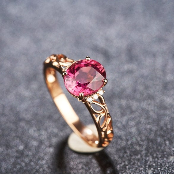 14k Gold 1.82 Ct Natural Tourmaline & Diamond Ring: Ref:231192428 // gold content:14k gold // ring size:7. 25us // // main gemstone:tourmaline // shape:oval // carat weight:1. 82ct // color:red // treatment:natural // // adjacent gemstone 2 : diamond /