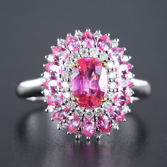 14k Gold 2.18 Ctw Natural Padparadscha Sapphire & Sapphire Ring: Ref:231193124 // gold content:14k gold // ring size:7. 25us // // main gemstone:padparadscha sapphire // shape:oval // carat weight:1. 03ct // color:orangish pink // treatment:natural // // adjacent