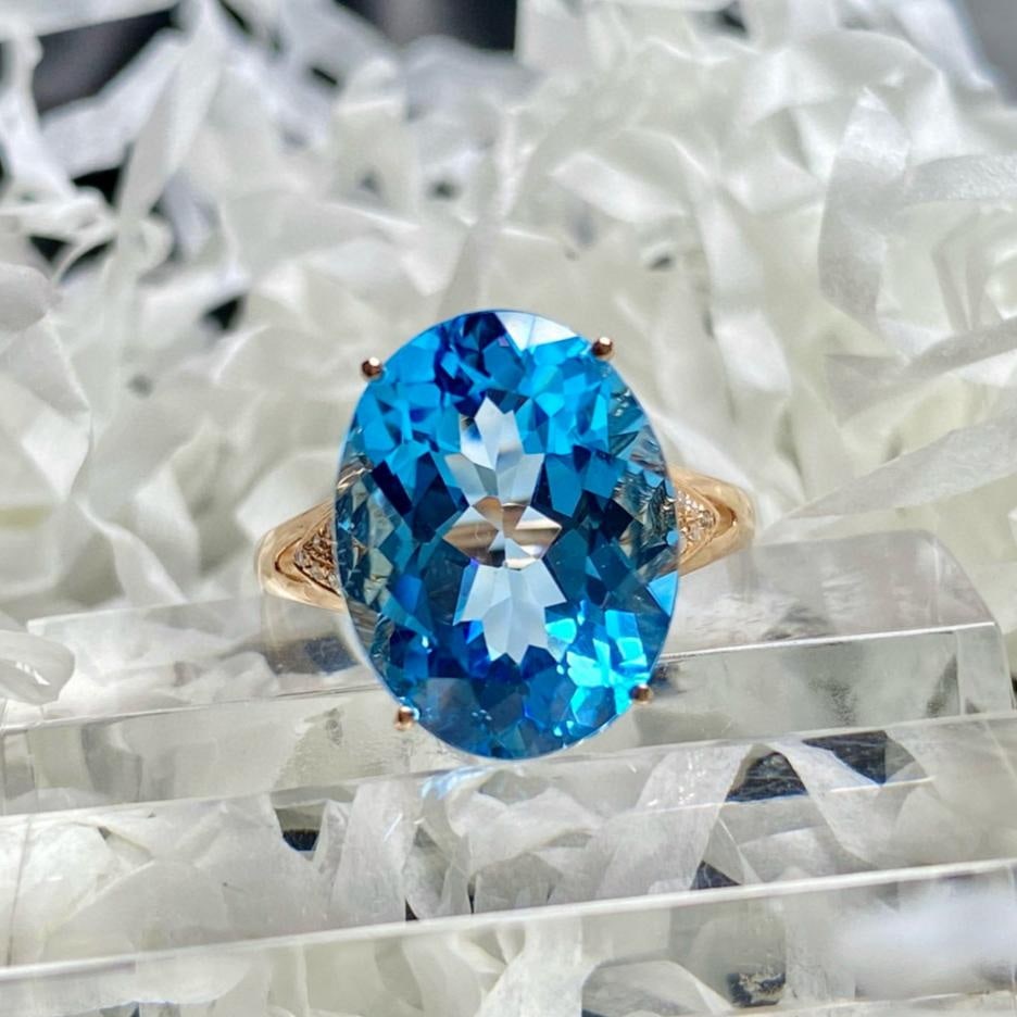 14k Gold 9.25 Ct Natural Topaz & Diamond Ring: Ref:231193145 // gold content:14k gold // ring size:7. 25us // // main gemstone:topaz // shape:oval // carat weight:9. 25ct // color:blue // treatment:natural // // adjacent gemstone 2 : diamond // nu