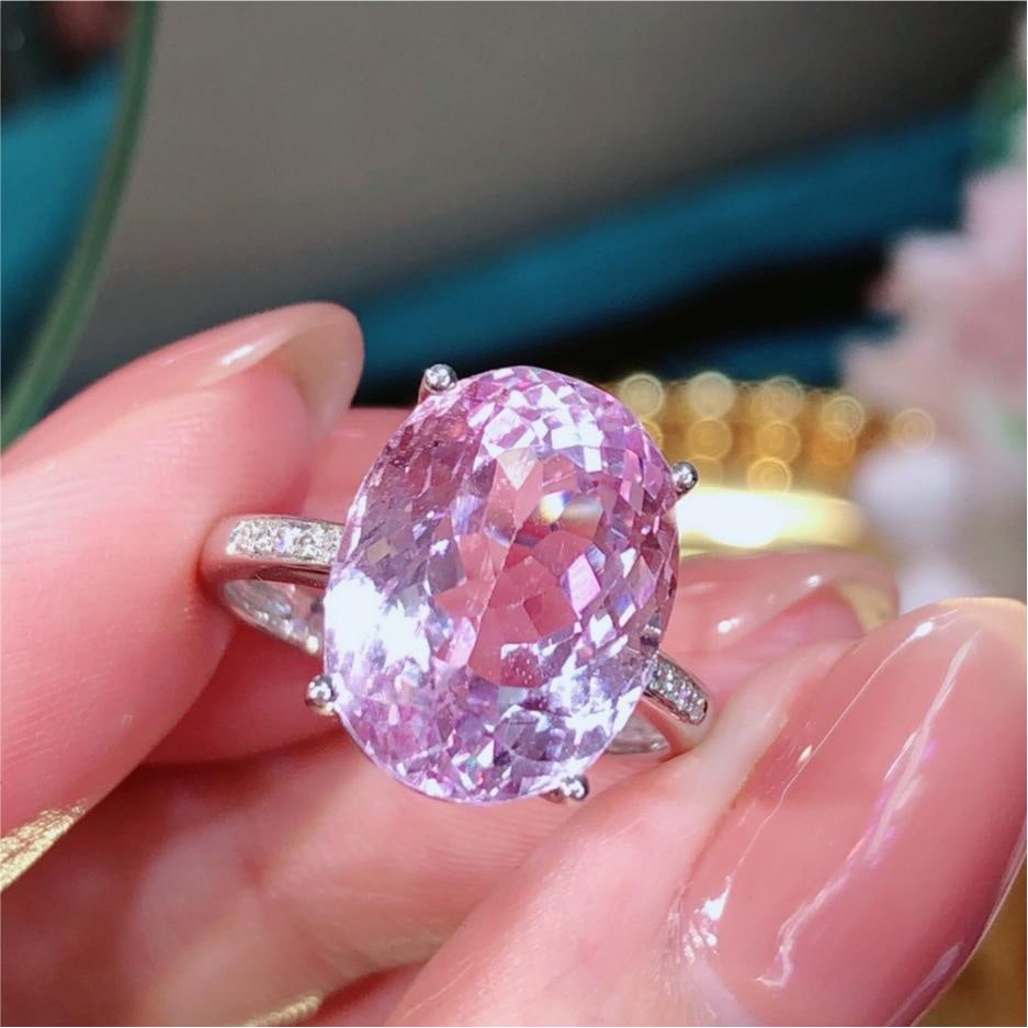 14k Gold 9.4 Ct Natural Kunzite & Diamond Ring: Ref:231193195 // gold content:14k gold // ring size:7. 25us // // main gemstone:kunzite // shape:oval // carat weight:9. 4ct // color:pinkish purple // treatment:natural // // adjacent gemstone 2 :